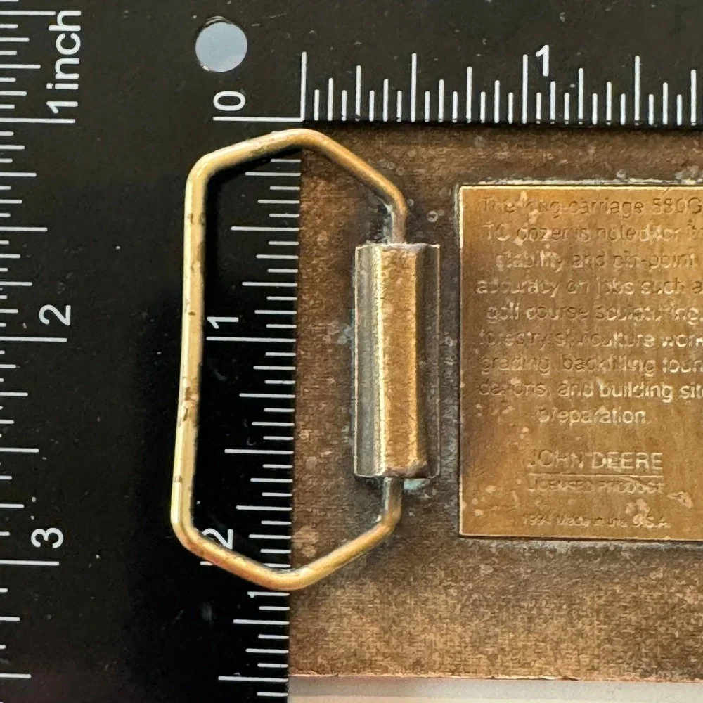 John Deere vintage brass